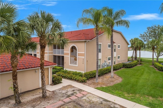 2770 Cypress Trace Cir Unit 2428, Naples, FL 34119 - view of property with a water view