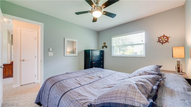 301 SE 26th Ter, Cape Coral, FL 33904 - bedroom featuring carpet floors and a ceiling fan