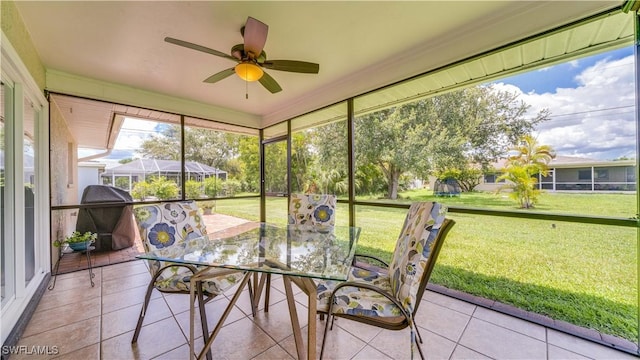 301 SE 26th Ter, Cape Coral, FL 33904 - sunroom with ceiling fan and outdoor dining area
