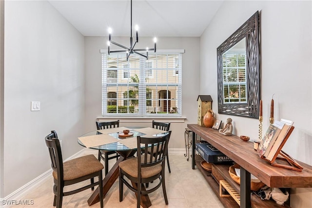 28082 Sosta Ln Unit 2, Bonita Springs, FL 34135 - dining room with a chandelier and baseboards