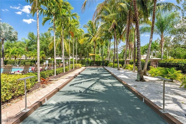 28082 Sosta Ln Unit 2, Bonita Springs, FL 34135 - view of community with a game area and view of scattered trees
