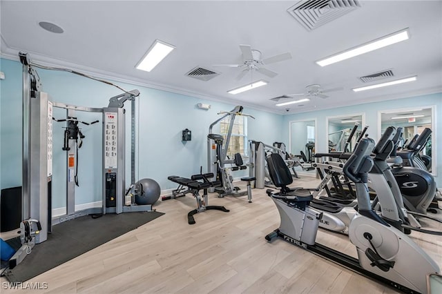 28082 Sosta Ln Unit 2, Bonita Springs, FL 34135 - workout area with ceiling fan, wood finished floors, plenty of natural light, and ornamental molding