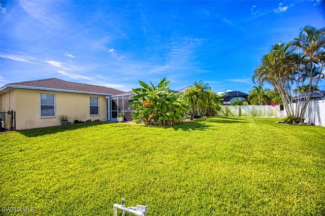 4512 SW 20th Ave, Cape Coral, FL 33914 - fenced backyard with a lanai
