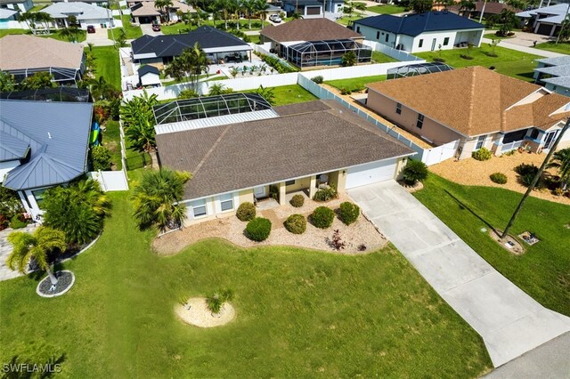 4512 SW 20th Ave, Cape Coral, FL 33914 - aerial perspective of suburban area