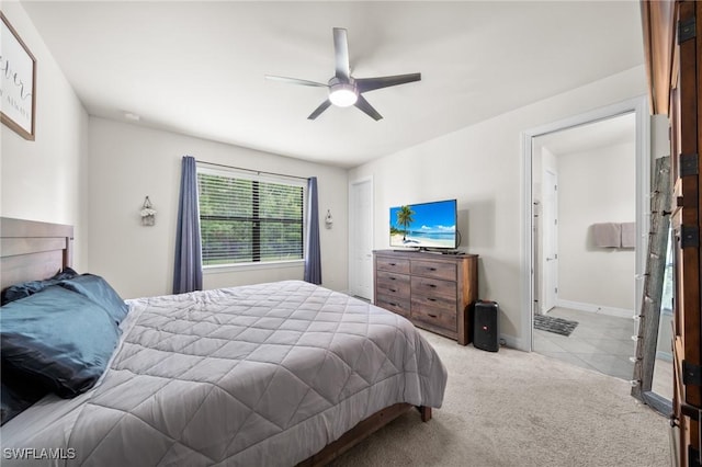 3336 Hampton Blvd, Alva, FL 33920 - bedroom featuring light carpet, ceiling fan, and ensuite bathroom