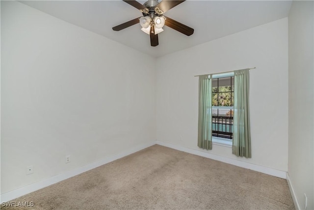 202 N Cypress St, Labelle, FL 33935 - empty room featuring light colored carpet and a ceiling fan