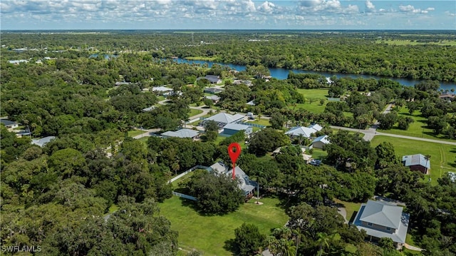 202 N Cypress St, Labelle, FL 33935 - aerial view of property and surrounding area featuring a large body of water