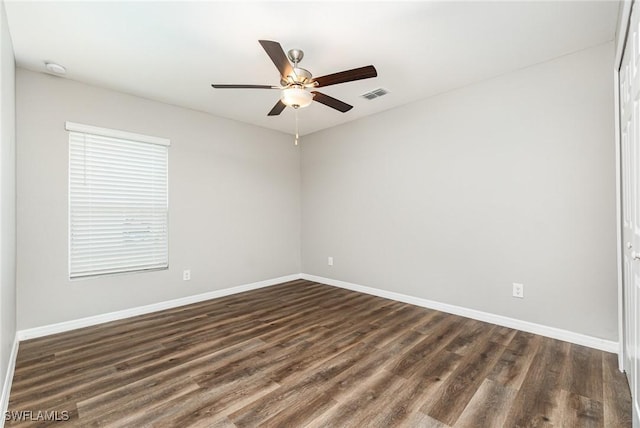 849 Haleybury St, Port Charlotte, FL 33948 - unfurnished room featuring ceiling fan and dark wood finished floors