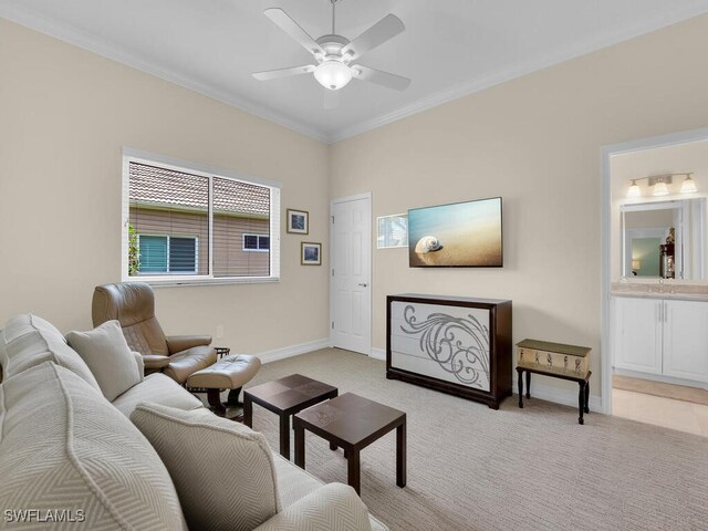 23220 Whispering Ridge Dr, Estero, FL 34135 - living room featuring a ceiling fan, light carpet, and crown molding