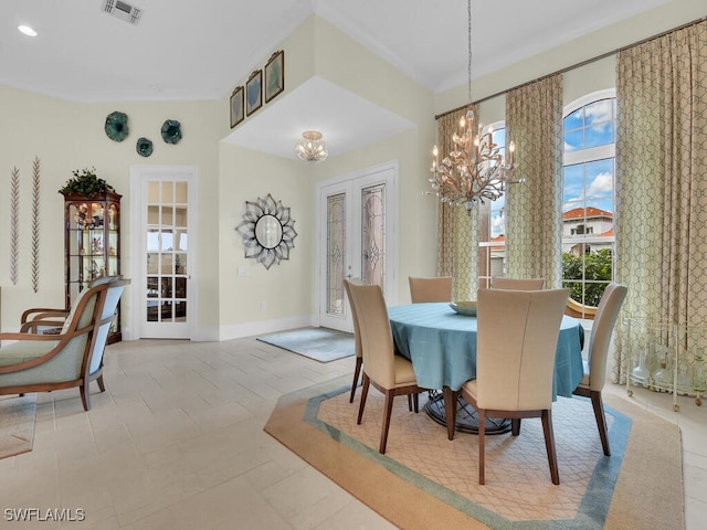 23220 Whispering Ridge Dr, Estero, FL 34135 - dining space with a chandelier and baseboards