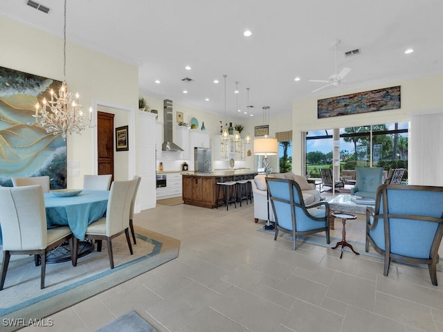 23220 Whispering Ridge Dr, Estero, FL 34135 - dining room featuring a chandelier, a ceiling fan, and recessed lighting
