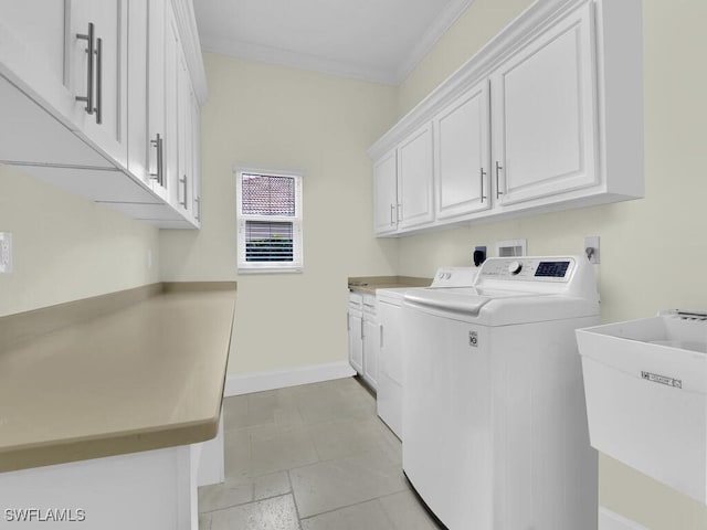 23220 Whispering Ridge Dr, Estero, FL 34135 - laundry area featuring cabinet space, washing machine and dryer, and ornamental molding