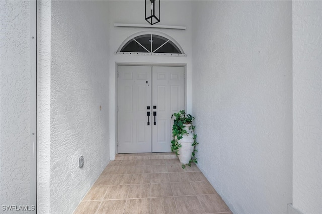 973 Summerfield Dr, Naples, FL 34120 - view of exterior entry with stucco siding
