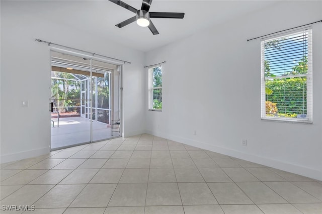973 Summerfield Dr, Naples, FL 34120 - empty room with a ceiling fan and light tile patterned floors