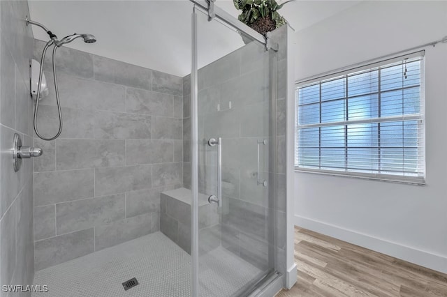 973 Summerfield Dr, Naples, FL 34120 - bathroom with a shower stall and wood finished floors