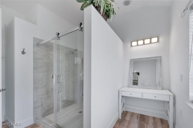 973 Summerfield Dr, Naples, FL 34120 - bathroom featuring a shower stall, wood finished floors, and vanity