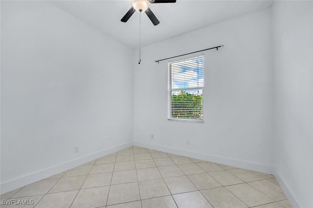 973 Summerfield Dr, Naples, FL 34120 - unfurnished room featuring light tile patterned floors and a ceiling fan