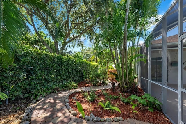 973 Summerfield Dr, Naples, FL 34120 - view of yard with a lanai