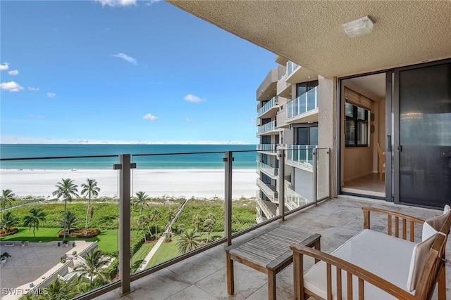 176 S Collier Blvd Unit 1107, Marco Island, FL 34145 - balcony featuring view of water and beach