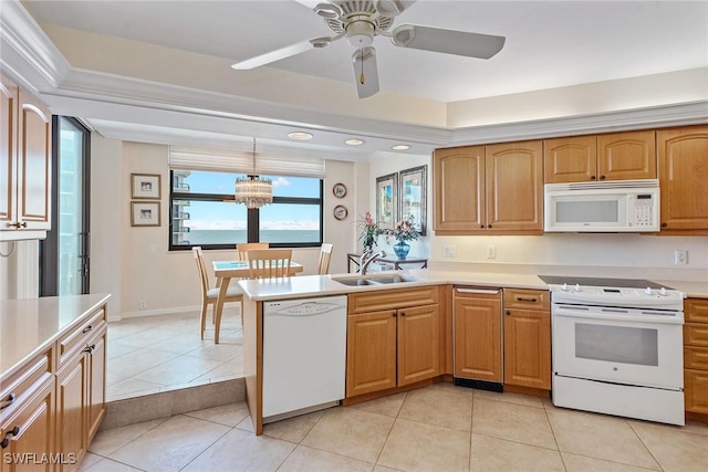 176 S Collier Blvd Unit 1107, Marco Island, FL 34145 - kitchen featuring white appliances, light countertops, light tile patterned floors, a ceiling fan, and a peninsula