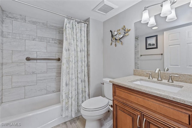 176 S Collier Blvd Unit 1107, Marco Island, FL 34145 - bathroom with vanity, shower / bathtub combination with curtain, and wood finished floors