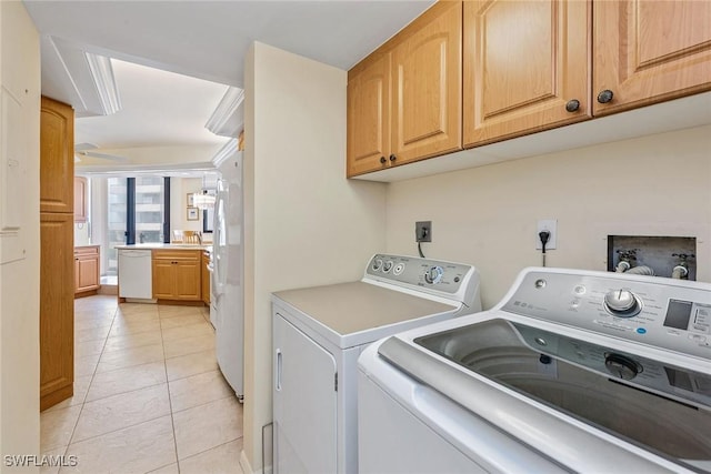 176 S Collier Blvd Unit 1107, Marco Island, FL 34145 - laundry area with separate washer and dryer, light tile patterned floors, cabinet space, and a ceiling fan