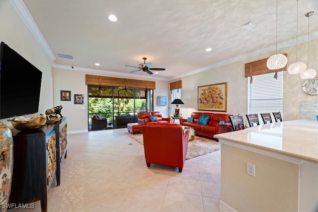 3051 Hudson Ter, Naples, FL 34119 - living room with a ceiling fan, ornamental molding, recessed lighting, and light tile patterned floors