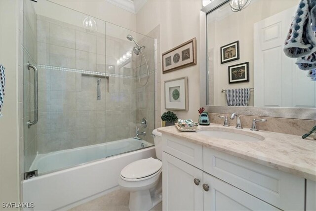 3051 Hudson Ter, Naples, FL 34119 - bathroom featuring vanity, combined bath / shower with glass door, and ornamental molding
