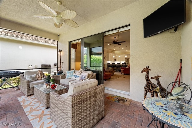 3051 Hudson Ter, Naples, FL 34119 - view of patio featuring a ceiling fan and an outdoor hangout area