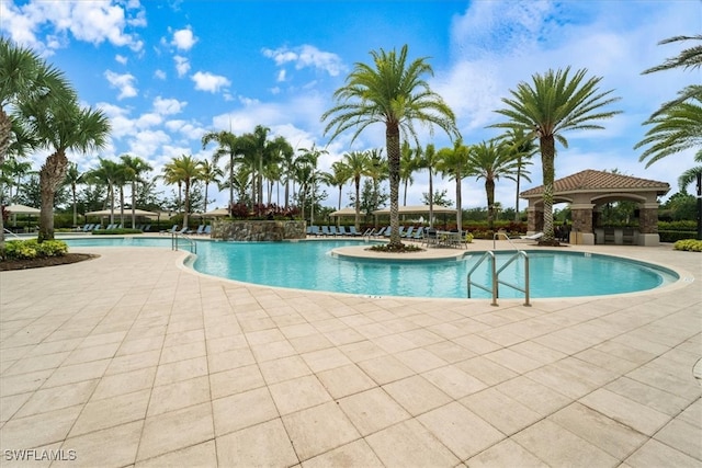 3051 Hudson Ter, Naples, FL 34119 - community pool with a patio and a gazebo
