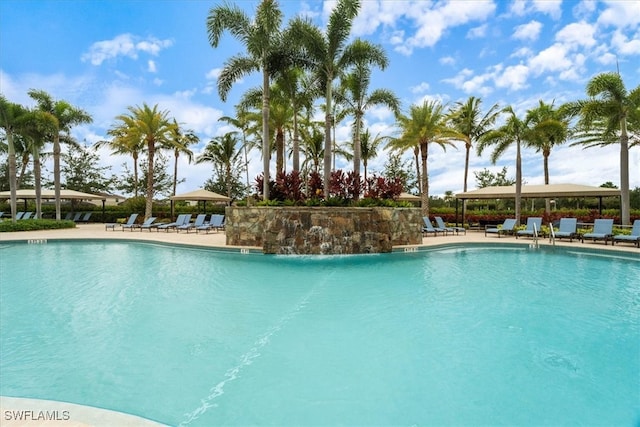 3051 Hudson Ter, Naples, FL 34119 - community pool with a patio