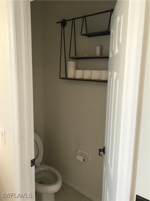 11491 Axis Deer Ln, Fort Myers, FL 33966 - bathroom featuring toilet and tile patterned flooring