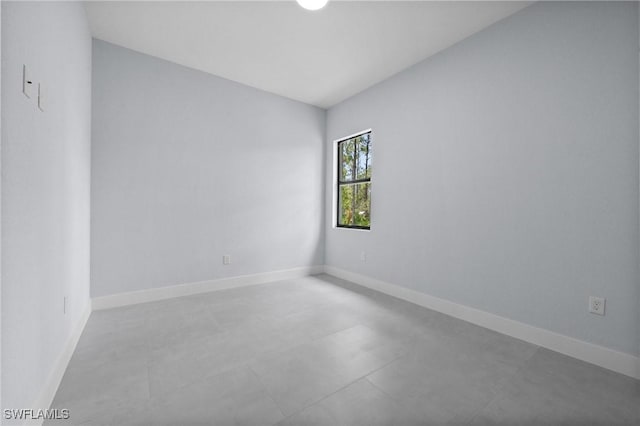 4234 27th Ave NE, Naples, FL 34120 - spare room with baseboards