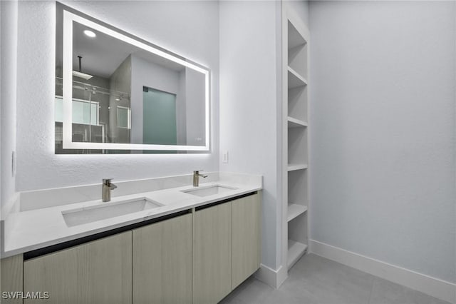 4234 27th Ave NE, Naples, FL 34120 - full bathroom with a shower stall, double vanity, and tile patterned flooring
