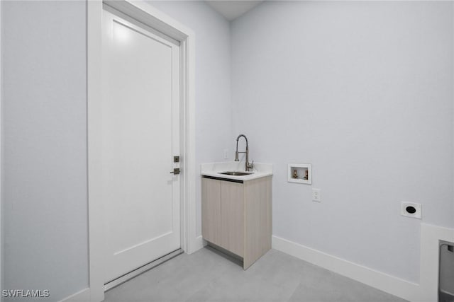 4234 27th Ave NE, Naples, FL 34120 - laundry room with electric dryer hookup, washer hookup, and cabinet space