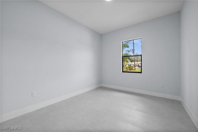 4234 27th Ave NE, Naples, FL 34120 - unfurnished room featuring baseboards