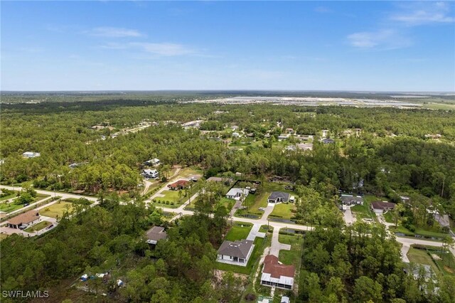 4234 27th Ave NE, Naples, FL 34120 - aerial overview of property's location featuring a forest