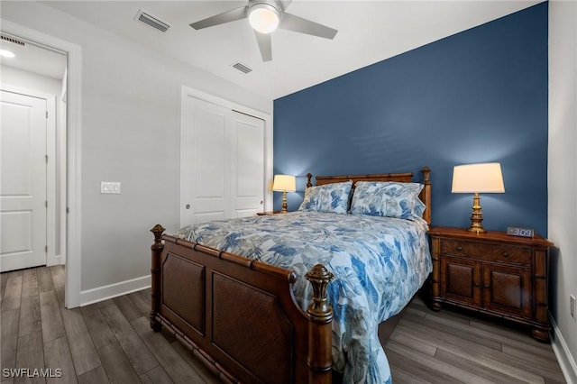 42243 Edgewater Dr, Punta Gorda, FL 33982 - bedroom featuring wood finished floors, a closet, and ceiling fan