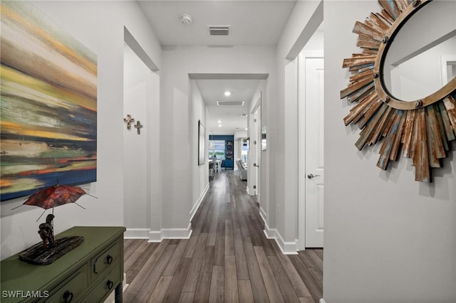 42243 Edgewater Dr, Punta Gorda, FL 33982 - corridor featuring dark wood-style flooring and recessed lighting