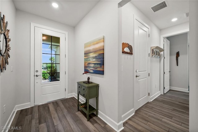 42243 Edgewater Dr, Punta Gorda, FL 33982 - entryway with dark wood-type flooring and recessed lighting