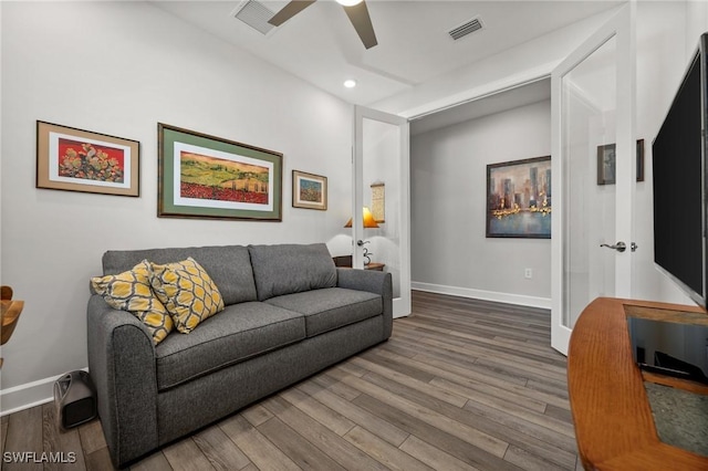 42243 Edgewater Dr, Punta Gorda, FL 33982 - living room featuring a ceiling fan, wood finished floors, and recessed lighting