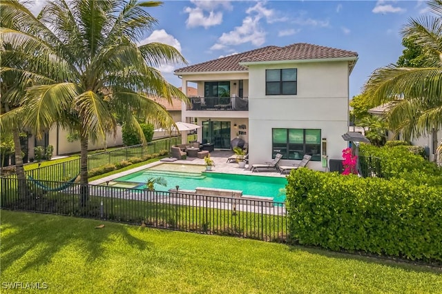 4692 Kensington Cir, Naples, FL 34119 - rear view of property with a balcony, stucco siding, a fenced backyard, and a patio