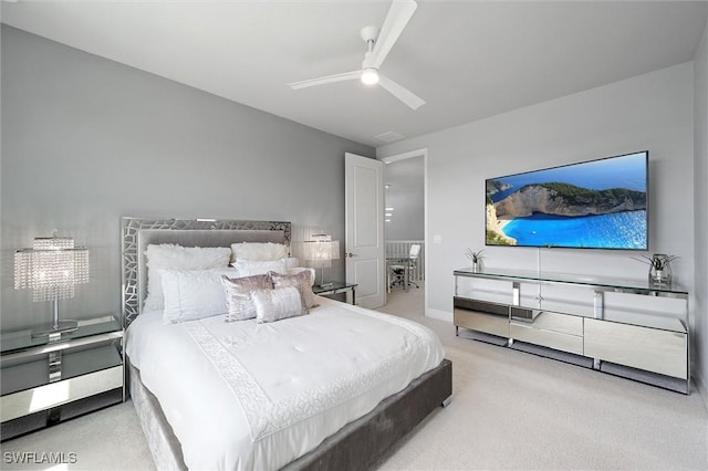 4692 Kensington Cir, Naples, FL 34119 - bedroom featuring carpet floors and a ceiling fan