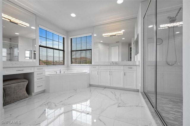4692 Kensington Cir, Naples, FL 34119 - full bathroom featuring a stall shower, vanity, a garden tub, marble finish floors, and recessed lighting