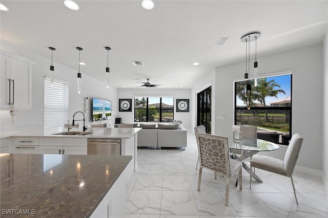 4692 Kensington Cir, Naples, FL 34119 - dining area with light marble finish floors, recessed lighting, and a ceiling fan