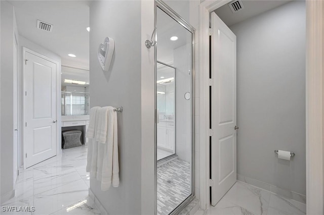 4692 Kensington Cir, Naples, FL 34119 - bathroom with marble look tiles, a stall shower, and recessed lighting