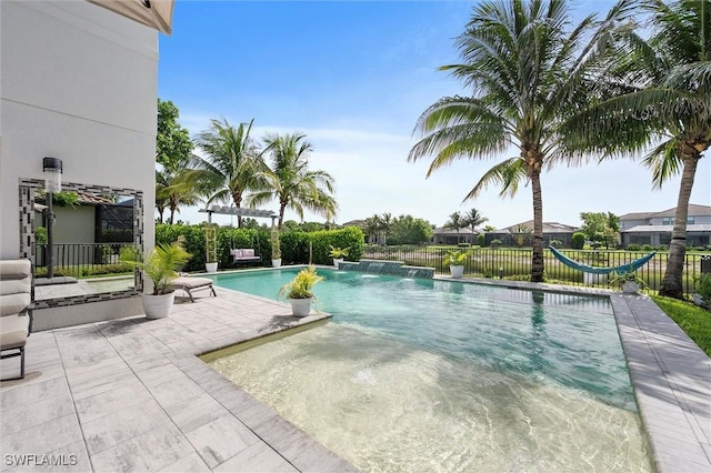 4692 Kensington Cir, Naples, FL 34119 - view of swimming pool featuring a patio