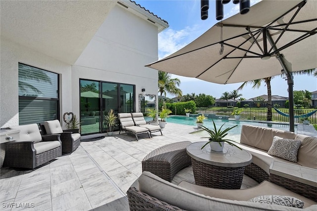 4692 Kensington Cir, Naples, FL 34119 - view of patio / terrace featuring an outdoor hangout area and an outdoor pool