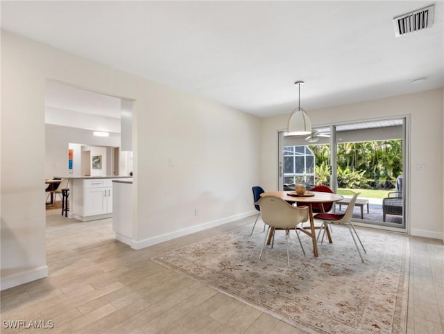 3704 Blue Heron Dr, Fort Myers, FL 33908 - dining room featuring light wood-type flooring