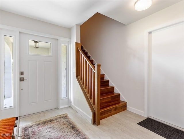 3704 Blue Heron Dr, Fort Myers, FL 33908 - foyer entrance featuring stairs and light wood finished floors
